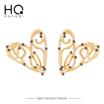 HUANQI אופנה רטרו סגסוגת אבץ לב צורה גיאומטריה חלול החוצה מתכת Stud עגילים לנשים בתכשיטים 2023 חדש